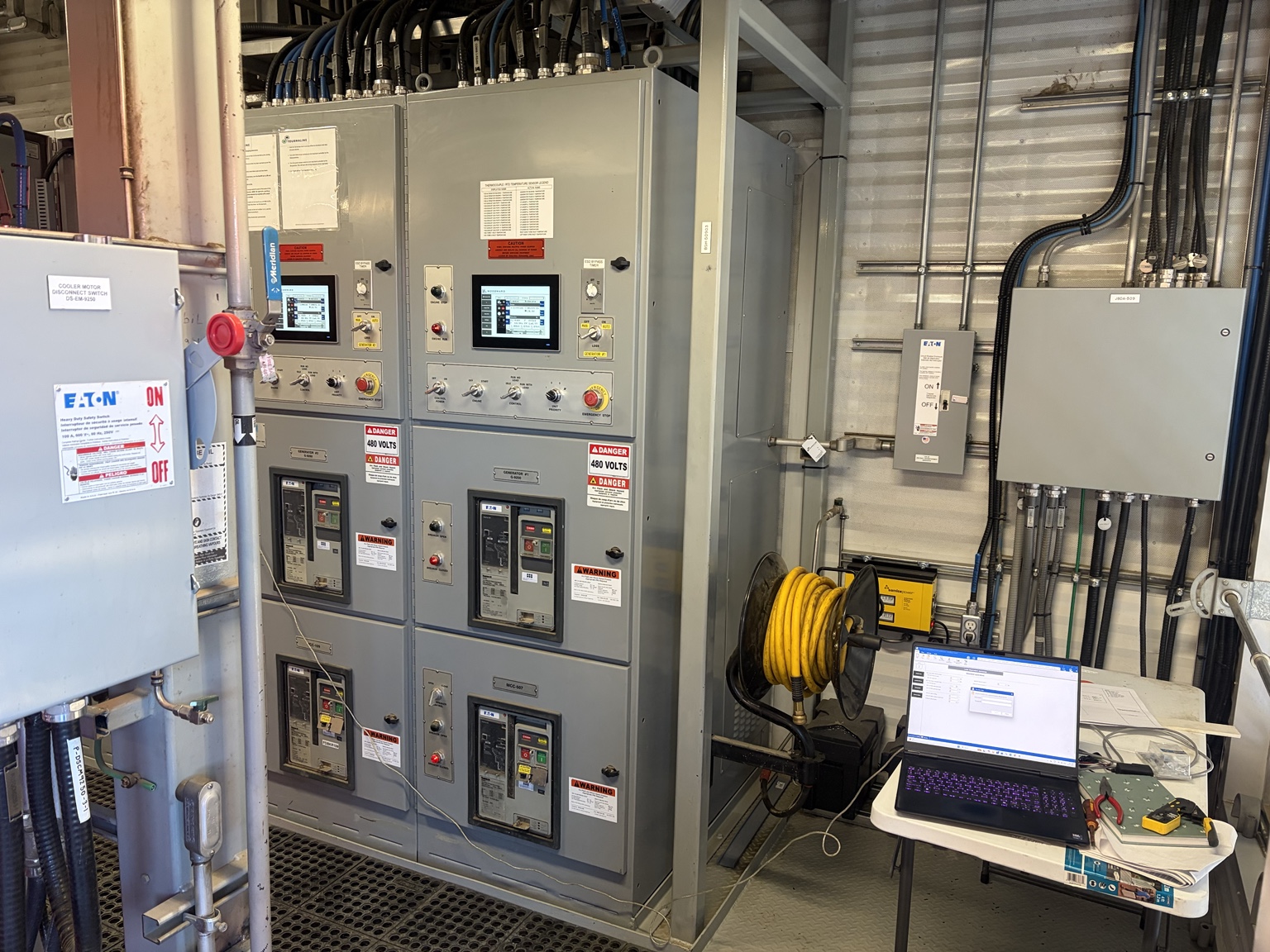 Generator switchgear with touchscreen controls and circuit breakers